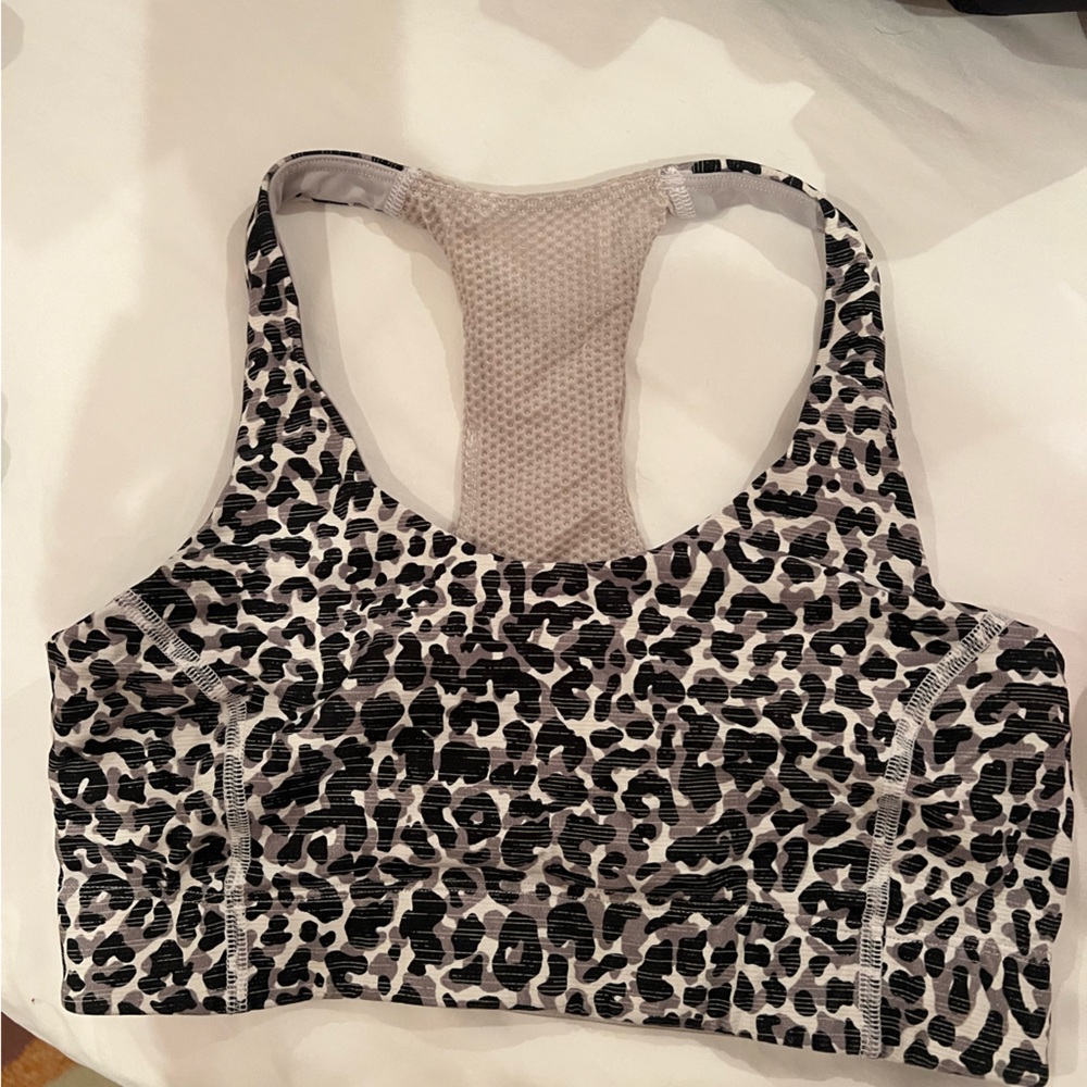 Outdoor Voices snow leopard doing things sports bra